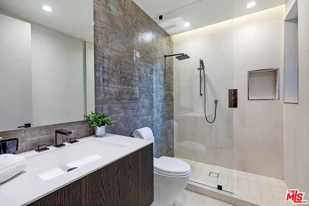 Casa Alegra — Bathroom vanity and shower